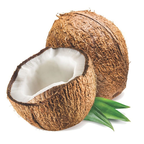 Full coconut broken in half, illustrating the benefits of coconut oil for cats