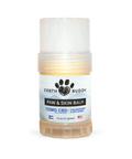 A tube of Earth Buddy hemp 125 mg Paw & Skin Balm for dogs on a wooden table. Perfect for dry skin & noses.
