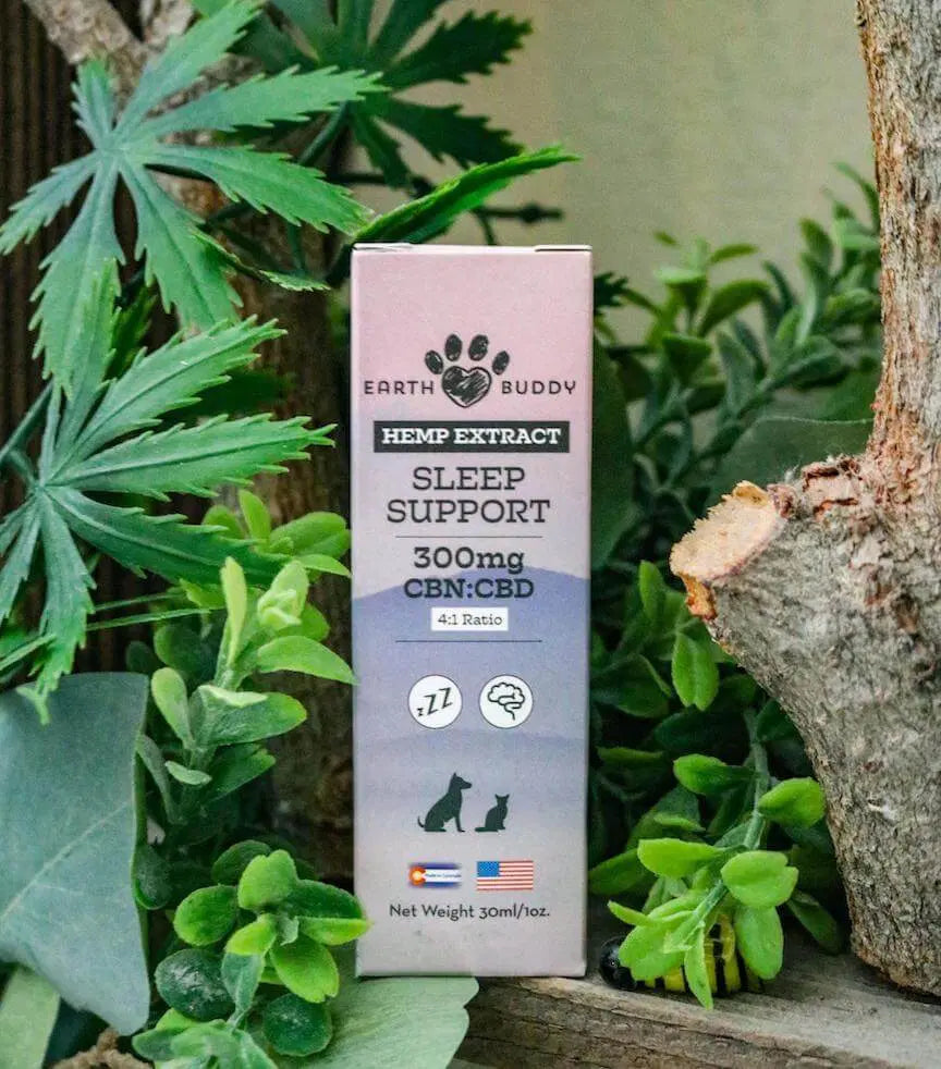 Earth Buddy's Sleep Support CBN oil for dogs and cats with hemp plants surrounding