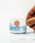 A jar of gut health supplements