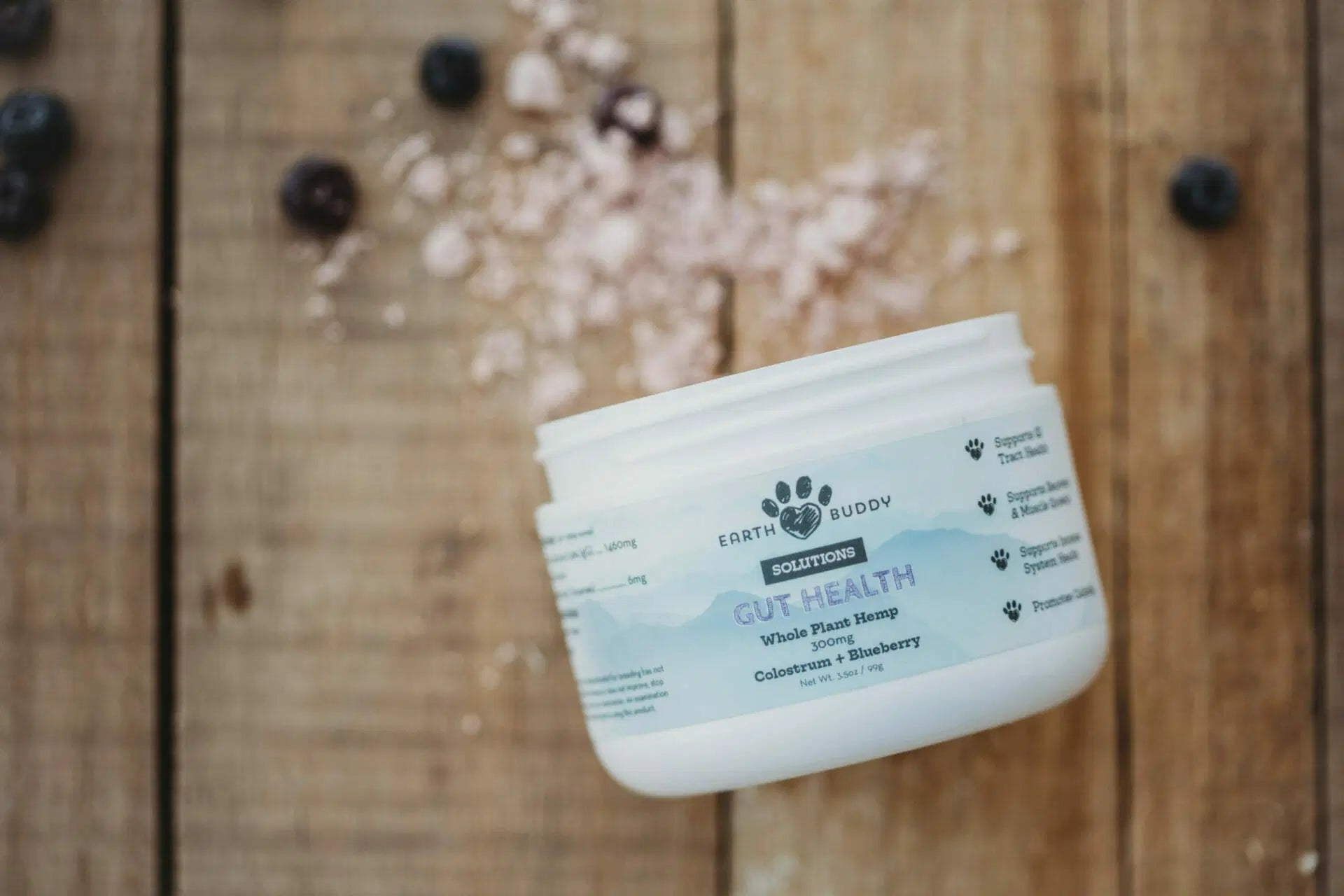 A container of Earth Buddy Gut Health and Focus + Immune. These products make the Immune Defense Pack for Cats & Small Breed Dogs.
