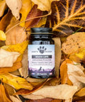 Earth Buddy’s Maxx Life Glutathione Supplement on yellow leaves. Support your aging dog with the Senior Support Pack for Large Breed Dogs.  
