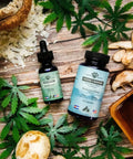 Two supplement bottles on a wooden surface with cannabis leaves and other natural elements.