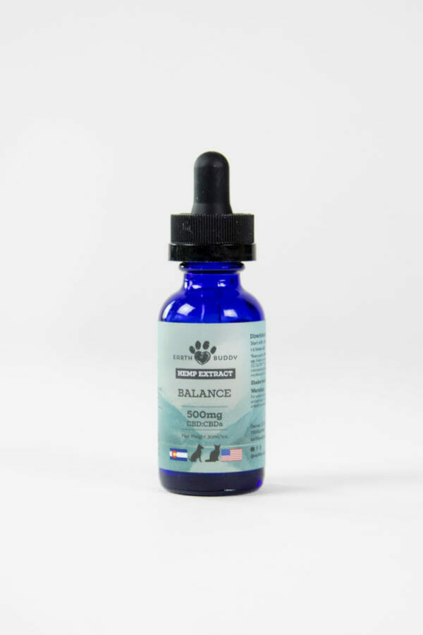 Earth Buddy Balance CBDa tincture for dogs and cats in a blue glass bottle with dropper.